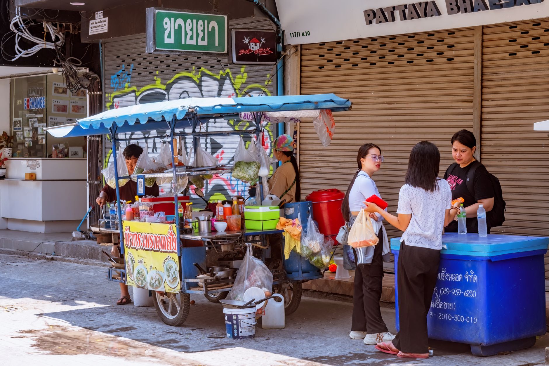Street food stalls serving local dishes in Thailand